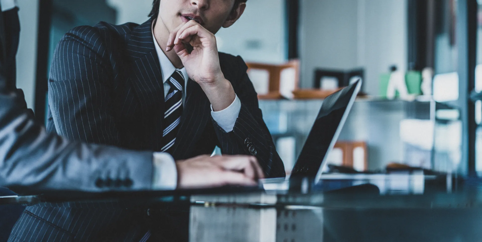 Photo of a man in a meeting